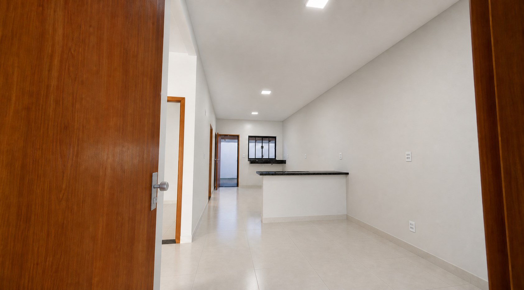 Sala e cozinha do Projeto Residencial R & T